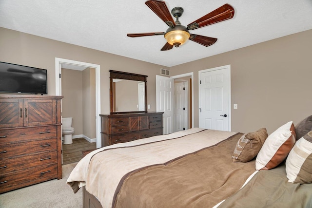 3513 Harris Dr, Joliet, IL 60431 - bedroom with ensuite bath, baseboards, carpet flooring, and ceiling fan
