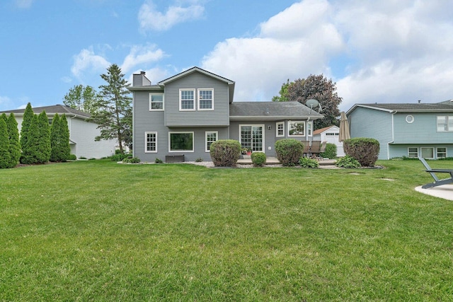 3513 Harris Dr, Joliet, IL 60431 - rear view of house featuring a chimney and a yard