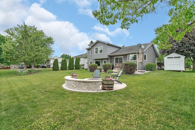 3513 Harris Dr, Joliet, IL 60431 - rear view of property with a lawn and a fire pit