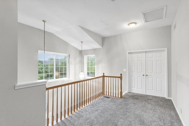 2451 Stonegate Rd Unit 2451, Algonquin, IL 60102 - hall featuring carpet flooring, baseboards, vaulted ceiling, and an upstairs landing