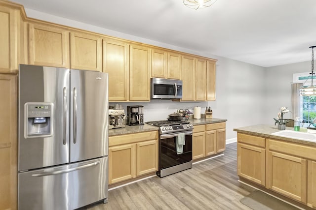 2451 Stonegate Rd Unit 2451, Algonquin, IL 60102 - kitchen featuring appliances with stainless steel finishes, light brown cabinets, light wood-type flooring, a sink, and light countertops