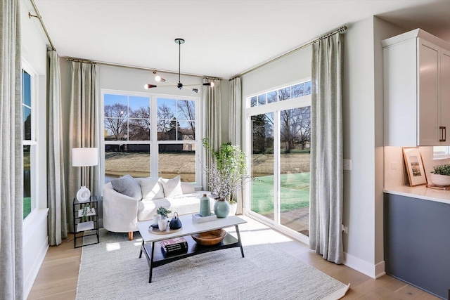 23244 W Teton Ln, Plainfield, IL 60585 - sunroom featuring a chandelier