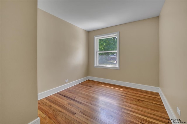 215 S Forest Ave, Palatine, IL 60074 - spare room featuring wood finished floors and baseboards