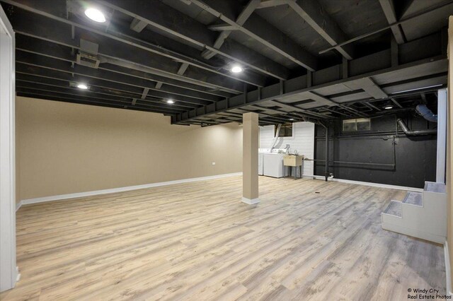 215 S Forest Ave, Palatine, IL 60074 - finished basement featuring baseboards, washer and dryer, and wood finished floors