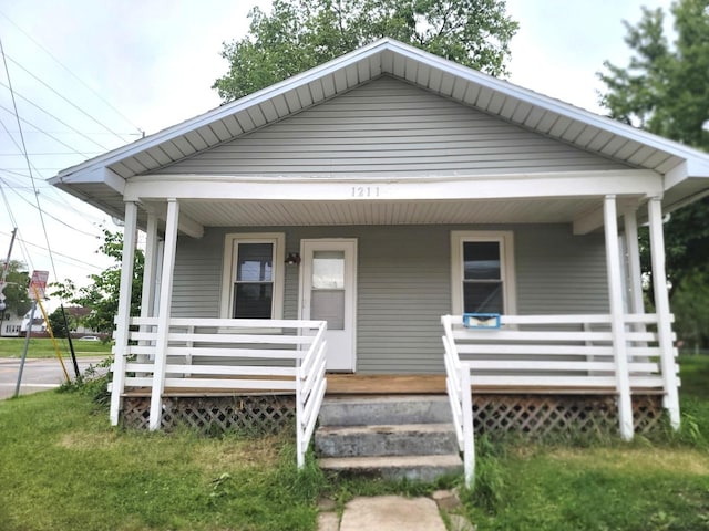 1211 S Clayton St, Bloomington, IL 61701 - view of front of house with a porch