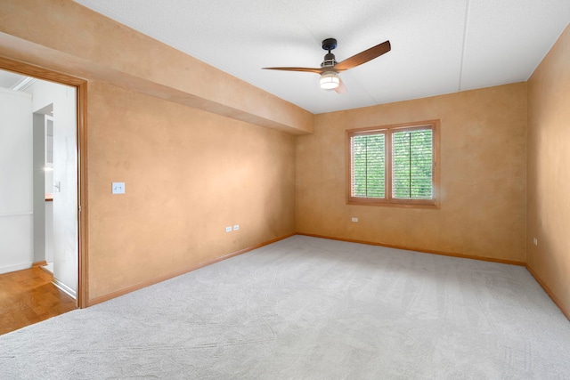 100 N Gary Ave N Unit 304, Wheaton, IL 60187 - carpeted spare room featuring a ceiling fan and baseboards