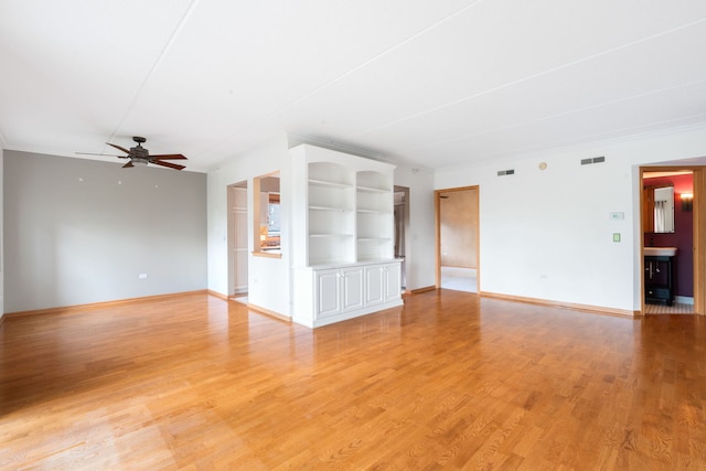 100 N Gary Ave N Unit 304, Wheaton, IL 60187 - unfurnished living room featuring ceiling fan, light wood-style floors, and crown molding