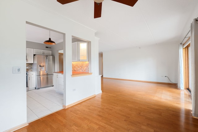 100 N Gary Ave N Unit 304, Wheaton, IL 60187 - empty room featuring ceiling fan, light wood-style flooring, and crown molding