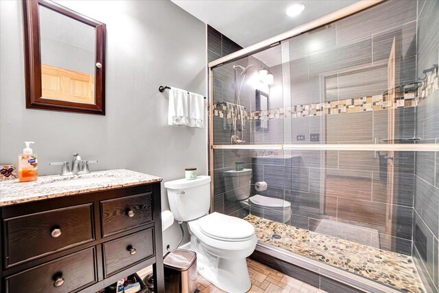 1016 W Willow Ln, Mount Prospect, IL 60056 - bathroom featuring toilet, a shower stall, vanity, and recessed lighting