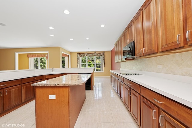 13881 Traverse Ct, Huntley, IL 60142 - kitchen with black appliances, plenty of natural light, decorative backsplash, recessed lighting, and light tile patterned floors