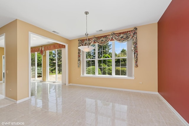 13881 Traverse Ct, Huntley, IL 60142 - unfurnished dining area with baseboards and light tile patterned floors