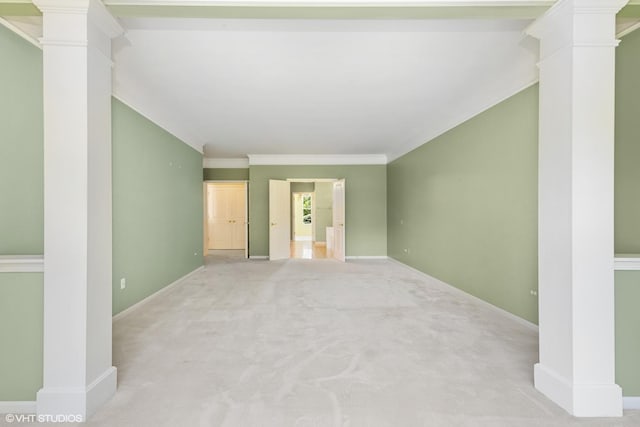 13881 Traverse Ct, Huntley, IL 60142 - unfurnished living room with ornate columns, carpet, baseboards, and crown molding