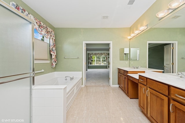 13881 Traverse Ct, Huntley, IL 60142 - full bathroom featuring double vanity, a garden tub, and tile patterned flooring