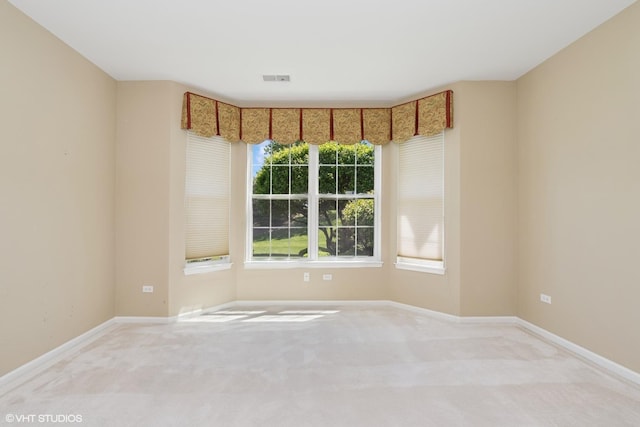 13881 Traverse Ct, Huntley, IL 60142 - empty room featuring light carpet and baseboards