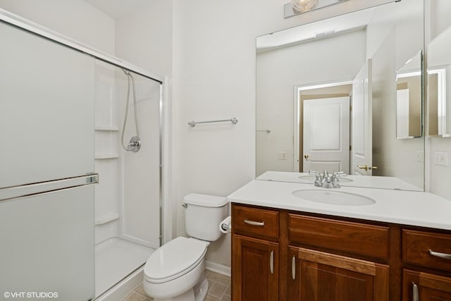 13881 Traverse Ct, Huntley, IL 60142 - full bathroom featuring a shower stall, toilet, tile patterned floors, vanity, and baseboards