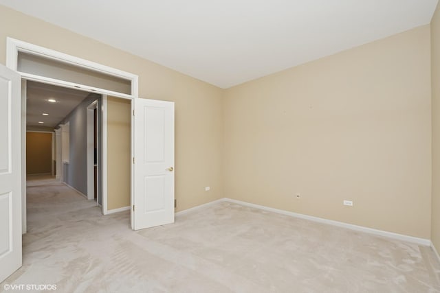 13881 Traverse Ct, Huntley, IL 60142 - unfurnished bedroom with light colored carpet, baseboards, and recessed lighting