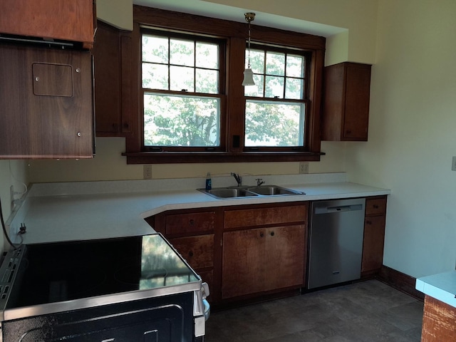 516 S Grant St, Earlville, IL 60518 - kitchen with stainless steel appliances, light countertops, and pendant lighting