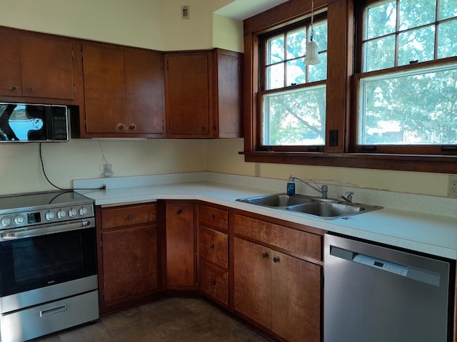 516 S Grant St, Earlville, IL 60518 - kitchen featuring appliances with stainless steel finishes and light countertops