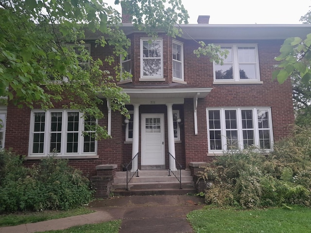 516 S Grant St, Earlville, IL 60518 - view of front of house with entry steps and brick siding