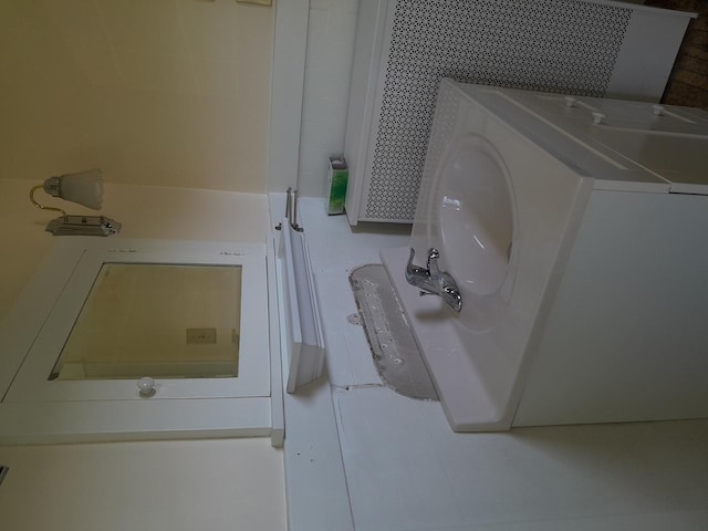 516 S Grant St, Earlville, IL 60518 - bathroom with washer / dryer