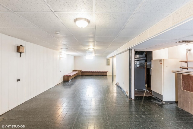 12746 S Marquette Ave, Chicago, IL 60633 - below grade area with a drop ceiling and tile patterned floors