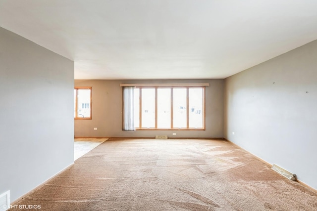 12746 S Marquette Ave, Chicago, IL 60633 - spare room with light carpet and baseboards