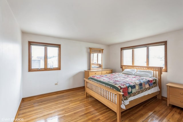 12746 S Marquette Ave, Chicago, IL 60633 - bedroom featuring light wood finished floors and baseboards