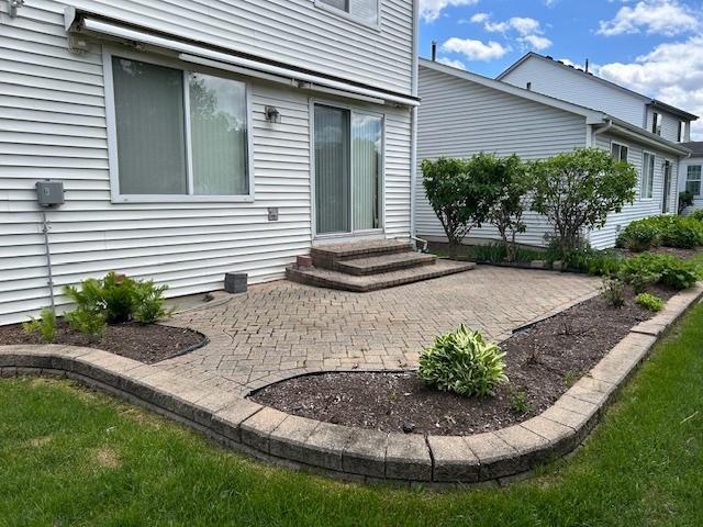13804 Ironwood Dr, Plainfield, IL 60544 - rear view of house with a patio area and entry steps