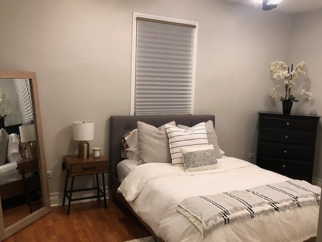 6643 W Belmont Ave Unit 1, Chicago, IL 60634 - bedroom featuring wood finished floors