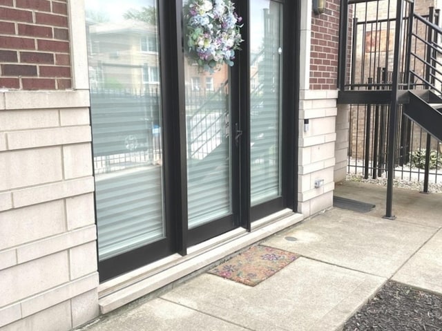 6643 W Belmont Ave Unit 1, Chicago, IL 60634 - entrance to property featuring brick siding