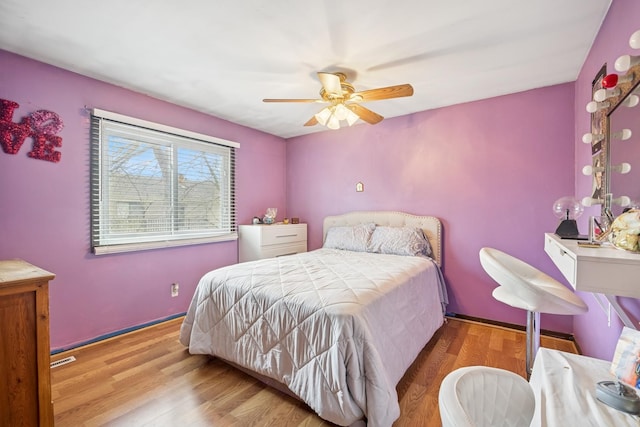 7 Woodmar Ct, Streamwood, IL 60107 - bedroom featuring wood finished floors and a ceiling fan