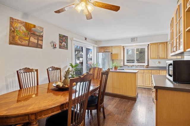 7 Woodmar Ct, Streamwood, IL 60107 - dining room with plenty of natural light, dark wood-type flooring, and a ceiling fan