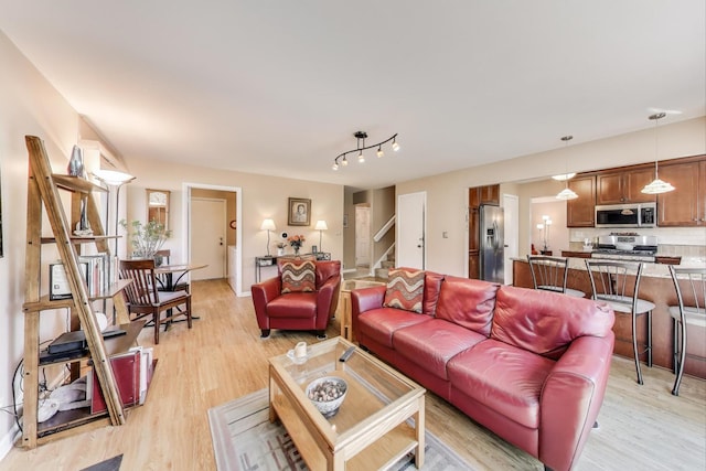 609 Bryce Trl, Roselle, IL 60172 - living area featuring light wood-style flooring and stairs