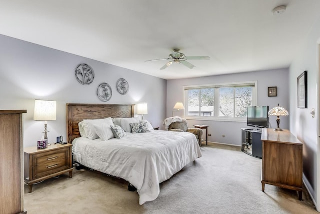 609 Bryce Trl, Roselle, IL 60172 - bedroom with light carpet, a ceiling fan, and baseboards