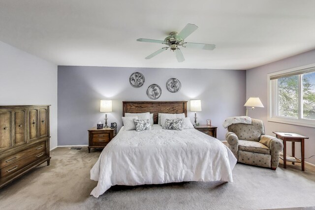 609 Bryce Trl, Roselle, IL 60172 - bedroom with light colored carpet, baseboards, and a ceiling fan