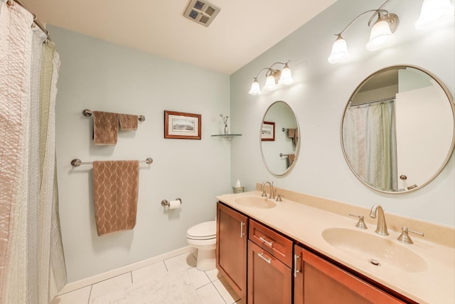 609 Bryce Trl, Roselle, IL 60172 - bathroom featuring tile patterned floors, toilet, double vanity, and baseboards