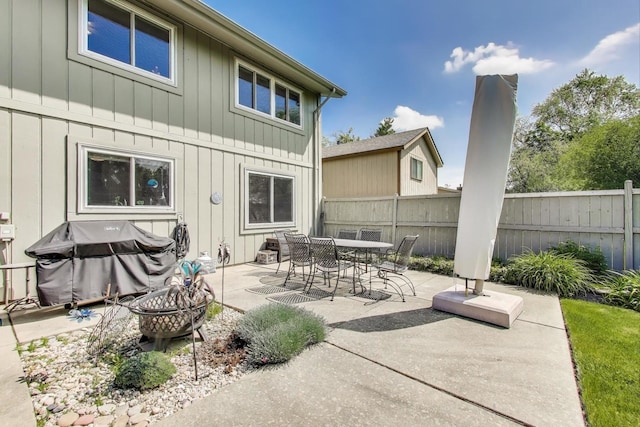 609 Bryce Trl, Roselle, IL 60172 - view of patio / terrace featuring fence, a fire pit, and outdoor dining area