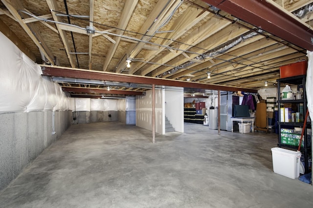 27363 W Macura St, Channahon, IL 60410 - unfinished basement featuring water heater and stairs