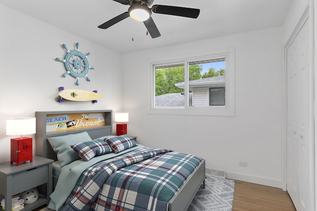 610 Catalpa Ln, Bartlett, IL 60103 - bedroom with wood finished floors, ceiling fan, and baseboards