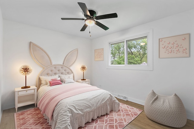 610 Catalpa Ln, Bartlett, IL 60103 - bedroom featuring wood finished floors, baseboards, and ceiling fan