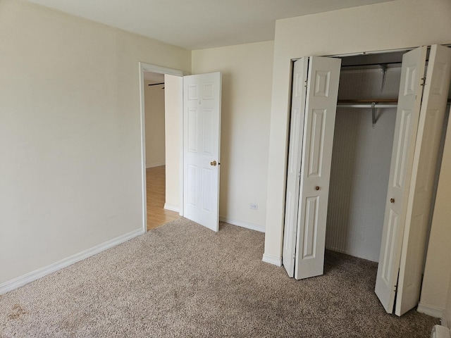 8928 Steven Dr Unit 2F, Des Plaines, IL 60016 - unfurnished bedroom with carpet, a closet, and baseboards