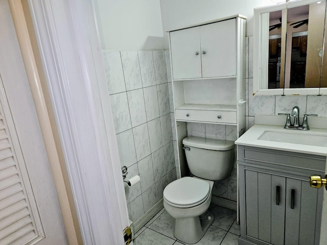 8928 Steven Dr Unit 2F, Des Plaines, IL 60016 - bathroom with toilet, tile walls, and vanity