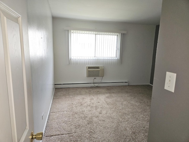 8928 Steven Dr Unit 2F, Des Plaines, IL 60016 - empty room with a wall mounted air conditioner, a baseboard radiator, and carpet flooring