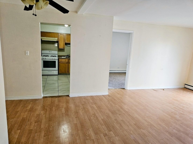 8928 Steven Dr Unit 2F, Des Plaines, IL 60016 - unfurnished living room featuring a baseboard radiator, light wood-style floors, ceiling fan, and baseboards