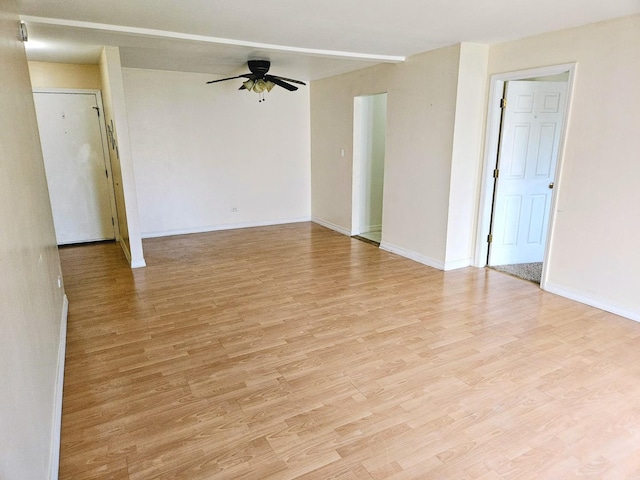 8928 Steven Dr Unit 2F, Des Plaines, IL 60016 - empty room featuring a ceiling fan, light wood-type flooring, and baseboards