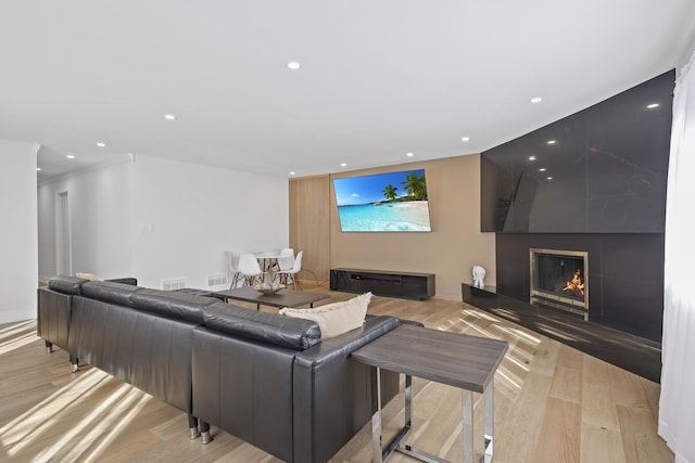 1184 Princeton Dr, Bartlett, IL 60103 - living area with recessed lighting, light wood-style flooring, and a large fireplace