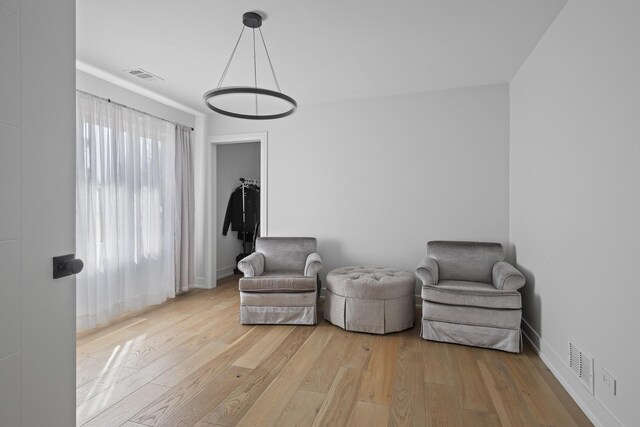 1184 Princeton Dr, Bartlett, IL 60103 - living area featuring light wood-style floors and baseboards