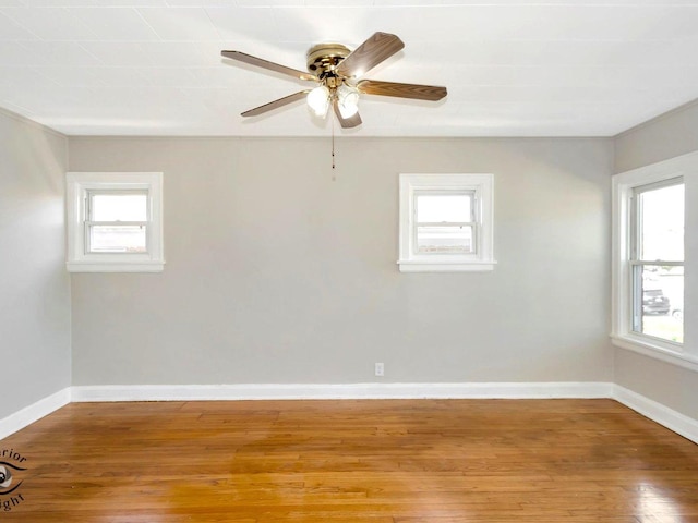 empty room with plenty of natural light and light wood-type flooring