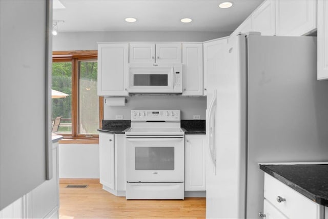 7417 N Hill Rd, Marengo, IL 60152 - kitchen with white appliances, white cabinetry, dark countertops, light wood-type flooring, and recessed lighting