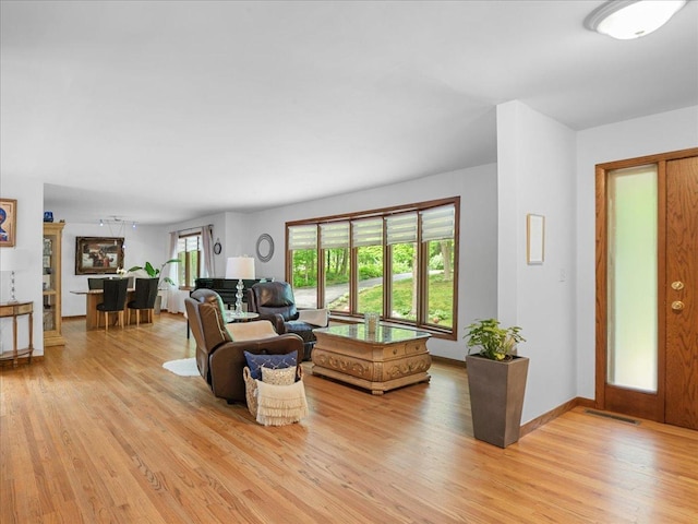 7417 N Hill Rd, Marengo, IL 60152 - living area with light wood-type flooring and baseboards